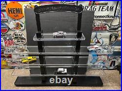 Display shelf for Hot Wheels 164 scale diecast. Holds appox 60 loose cars