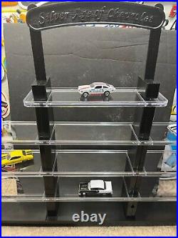 Display shelf for Hot Wheels 164 scale diecast. Holds appox 60 loose cars